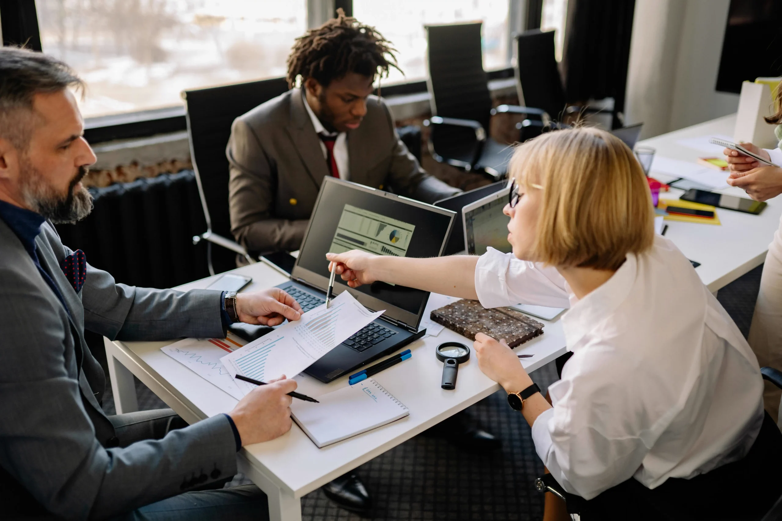 Legal professionals working within a modern technology-enabled office.